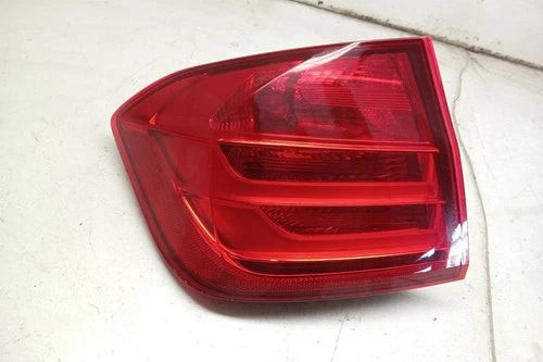 12 2012 BMW Driver LH Quarter Mounted Tail Light Lamp OEM used OEM tail light assembly