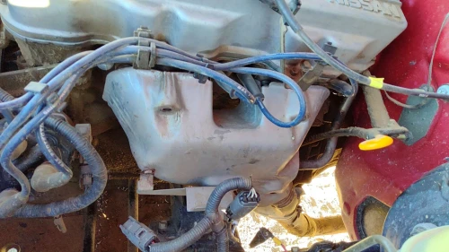 1990-1997 Nissan Hardbody 2.4L Used OEM Exhaust Manifold 1400486G06