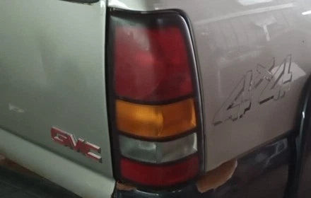 2004-2005 GMC Sierra 2500 1500 3500 Passenger RH Quarter Mounted Tail Lamp OEM used OEM tail light assembly