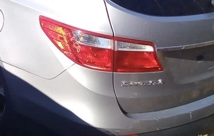 13-16 Hyundai Santa Fe LWB 3.3L Left Driver Quarter Mounted Tail Light OEM OEM used OEM tail light assembly