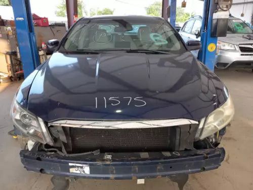 2011 Ford Taurus Lid Mounted L. Red Surround Used OEM Left Tail Light Assembly used OEM tail light assembly
