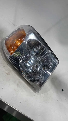 2006 GMC Envoy Right Used OEM Right Headlight Assembly used OEM headlight assembly