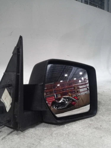 2009 Jeep Liberty Power Textured Non-Heated Right G Used OEM Right Door Mirror used OEM door mirror