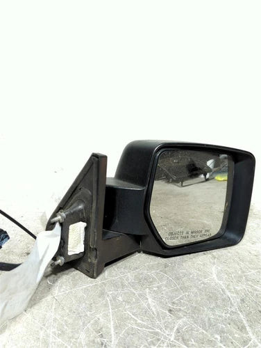2014 Jeep Patriot Moulded in Black Power Heated Opt Used OEM Right Door Mirror used OEM door mirror