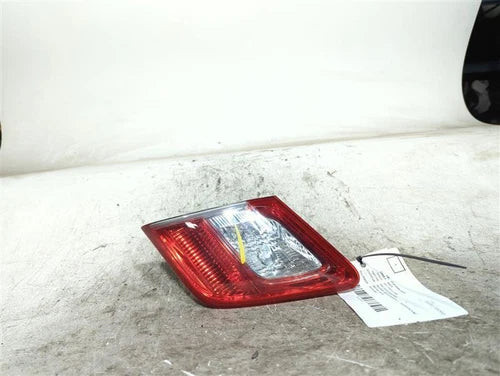 2011 Toyota Camry Decklid Mounted L. W/O Red Used OEM Left Tail Light Assembly used OEM tail light assembly