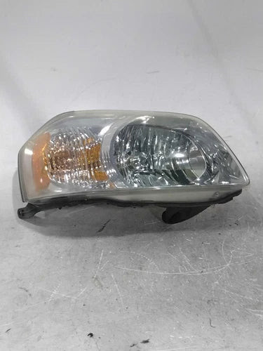 2005 Mazda Tribute Right Used OEM Right Headlight Assembly used OEM headlight assembly