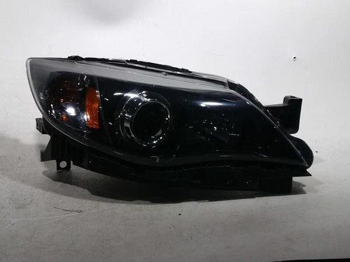 2009 Subaru Impreza Halogen Black Background Used OEM Right Headlight Assembly used OEM headlight assembly