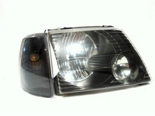 2003 Ford Explorer 4 Dr Exc. Sport Trac Righ Used OEM Right Headlight Assembly used OEM headlight assembly