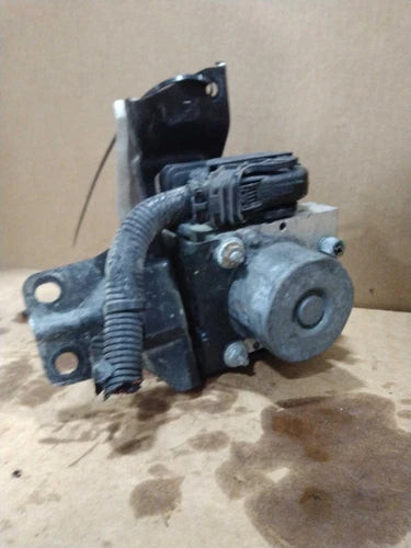 2016 Nissan Rogue ABS Pump Motor Silver Used OEM ABS Pumps & Modules used OEM ABS pump and module assembly