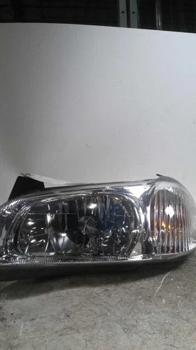 2000 Nissan Maxima Thru 8/99 Left Used OEM Left Headlight Assembly used OEM headlight assembly