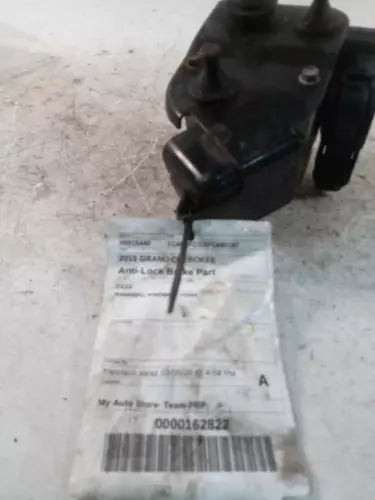2015 Jeep Grand Cherokee W/Adapt Used OEM ABS Pump and Motor Assembly used OEM ABS pump and module assembly