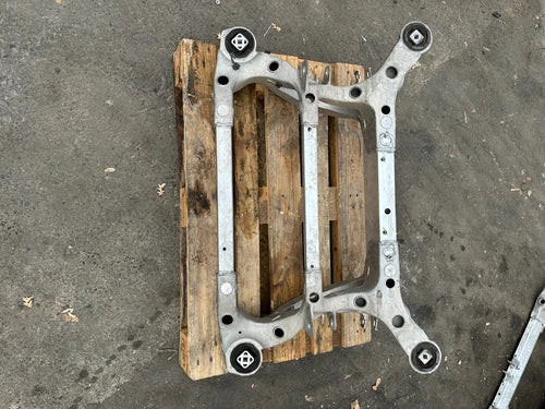 2012 - 2020 Tesla Model S / X Used OEM Rear Subframe Crossmember 6007012-00-F used OEM rear subframe and crossmember