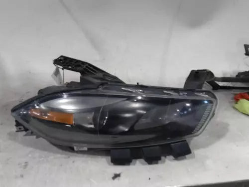 2015 Dodge Dart halogen black background Rig Used OEM headlight used OEM headlight