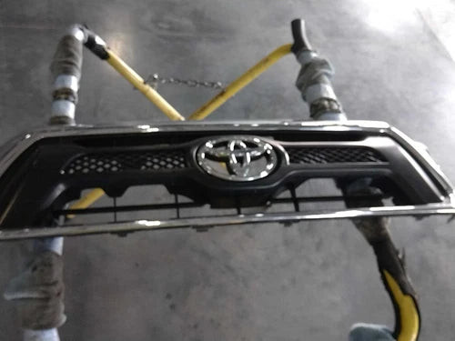 2015 Toyota Tacoma upper chrome surround Upper Used OEM grille used OEM grille