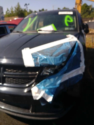 2015 Dodge Journey quad halogen black backgr Used OEM headlight used OEM headlight