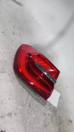 2016 BMW 750i quarter panel mounted Left Used OEM tail light used OEM tail light