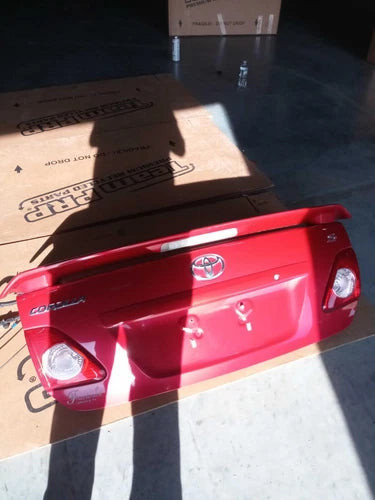 2009 Toyota Corolla RED OEM Tailgate 4DR w/spoiler Used 149K Miles used OEM spoiler
