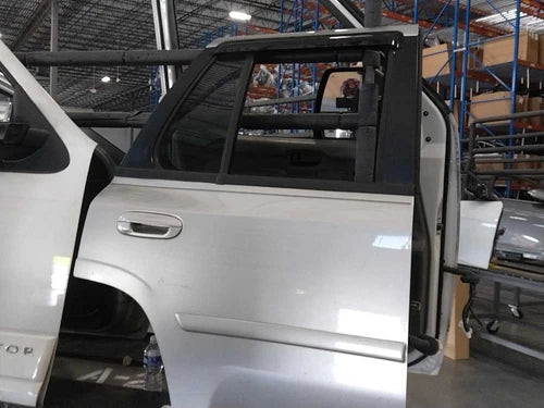 2006 GMC Envoy Rear Right Silver OEM Door Used Salvage Auto Parts used OEM complete door assembly