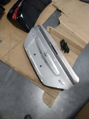 Nissan Versa 2016 Silver OEM Tailgate Used 6 Month Warranty Salvage used OEM liftgate or tailgate