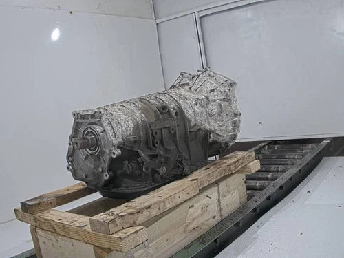 Used OEM BMW X3 3.0L Automatic Transmission Assembly 2005 Red used OEM transmission assembly