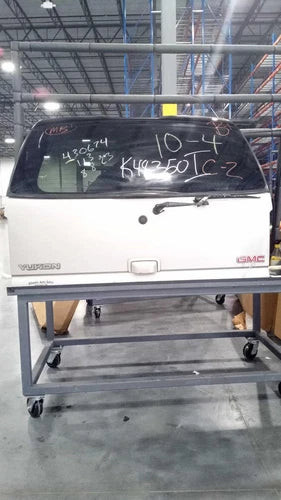 2004 GMC Yukon Grey OEM Tailgate Used 6 Month Warranty Salvage Part used OEM liftgate or tailgate