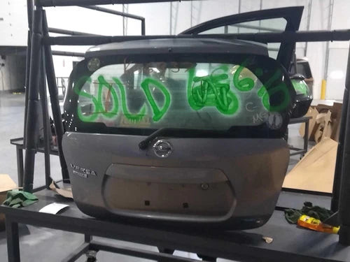 2014 Nissan Versa Grey OEM Tailgate 6 Mo Warranty Used 114K Miles used OEM liftgate or tailgate