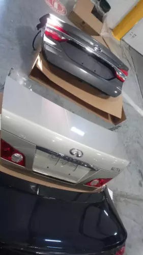 2007 Infiniti M35 TAN OEM Tailgate 97000 Miles Used Salvage Part used OEM liftgate or tailgate