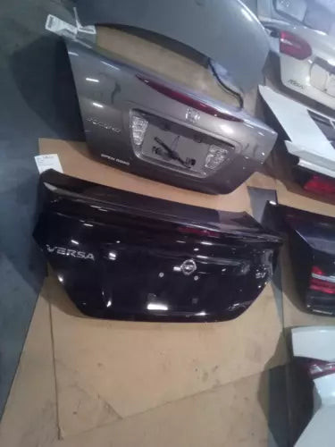 2017 Nissan Versa OEM Deck Lid Used 175K Miles Gray Color Salvage Part used OEM deck lid