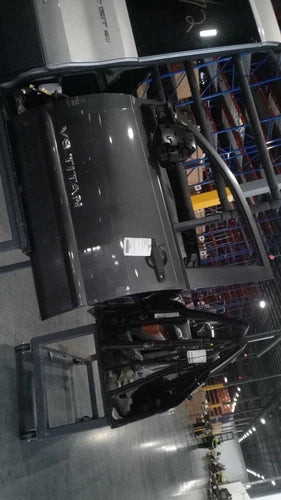 2010 Nissan Titan Front Left Grey OEM Used Door L Passenger Side used OEM complete door assembly