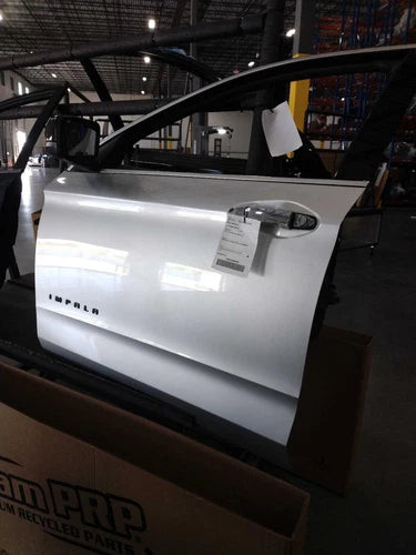 2016 Chevrolet Impala Left Front Silver OEM Used Door 2.50L used OEM complete door assembly