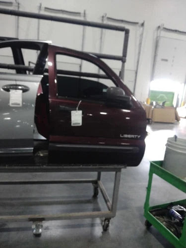 2004 Jeep Liberty R. electric window Used OEM complete door assembly used OEM complete door assembly