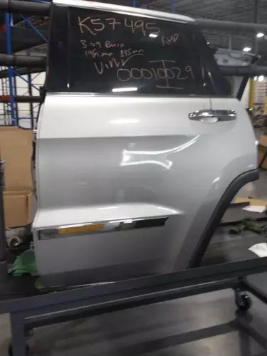 2013 Jeep Grand Cherokee L Rear Driver Side Silver OEM Used Door 55113635AH used OEM complete door assembly