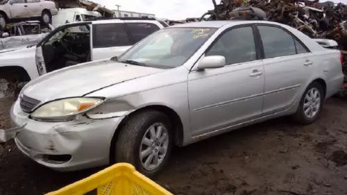 2002-2003 Toyota Camry Front Driver Left Strut Cartridge Assembly OEM used OEM strut or shock assembly