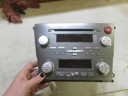 2007-2008 SUBARU LEGACY CD AM/FM 6 DISC RADIO WITH CLIMATE CONTROL used OEM A/C climate control module