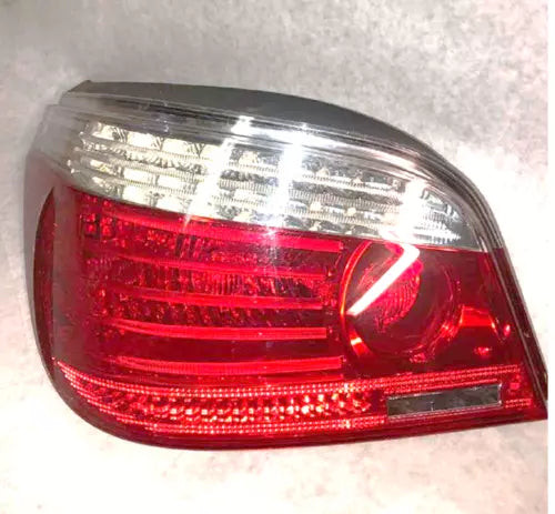 2008-2010 BMW 528i 535i 550i M5 Tail Light LH Driver Qtr Mount Assembly OEM used OEM tail light