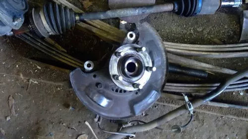 2002-2007 Subaru Impreza Forester REAR LEFT Spindle Knuckle Axle Disc Brakes used OEM steering knuckle