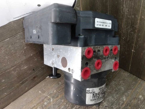 2005-2006 KIA SPORTAGE ABS Anti-Lock Brake Pump Module Assembly AWD used OEM ABS pump and module