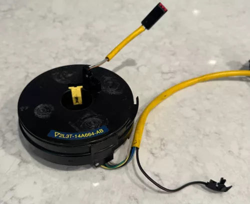 2002 FORD F-150 OEM CLOCK SPRING WITH CRUISE CONTROL 2L3T-14A664-AB used OEM clock spring