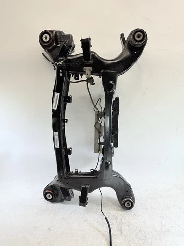 2014 - 2017 Maserati Ghibli Used OEM Rear Subframe Crossmember 9474C2 used OEM rear subframe and crossmember