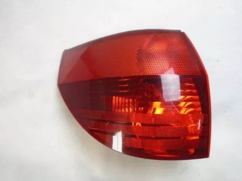 2004-2005 Toyota Sienna Left Driver Side Tail Light Assembly quarter panel OEM used OEM tail light