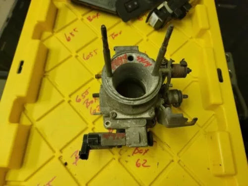 1998 - 2001 Nissan Frontier Xterra 2.4 Throttle Body Valve 4 Cylinder MT OEM used OEM throttle body