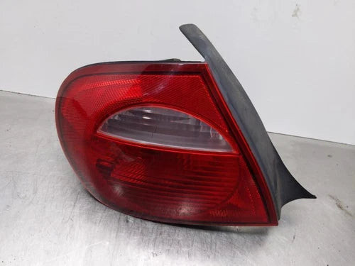 2003-2005 Dodge Neon Left Driver Side LH Tail Light Assembly used OEM tail light