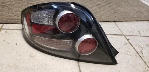 2007-2008 Hyundai Tiburon LH Driver Tail Light Quarter Panel Mounted OEM used OEM tail light