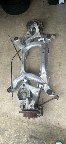 03-06 NISSAN 350Z 03-07 INFINITI G35 COUPE REAR CRADLE CROSSMEMBER SUBFRAME OEM used OEM rear subframe and crossmember