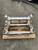 2012 - 2020 Tesla Model S / X Used OEM Rear Subframe Crossmember 6007012-00-K used OEM rear subframe and crossmember