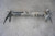 OEM Porsche Rear Subframe Suspension Torsion Bar Assembly 87-88 924s used OEM rear subframe and crossmember