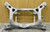 10-16 Porsche Panamera Rear Suspension Subframe Crossmember 97033105105 OEM used OEM rear subframe and crossmember