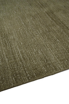 Vara rug in Olive, corner detail showing pile texture
