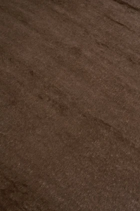 Mohair Shag rug in Carob, angled flatshot showing pile direction