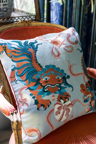 Lion Dance Blue Cushion by Guo Pei cushion roomset